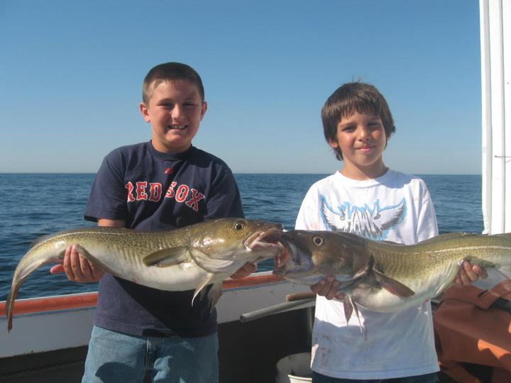 charter fishing kids with cod